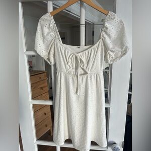 White eyelet mini dress with puff sleeve